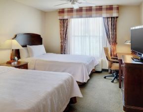 Day use twin room with TV and work desk at Homewood Suites By Hilton Burlington.