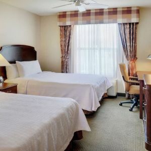 Day use twin room with TV and work desk at Homewood Suites By Hilton Burlington.