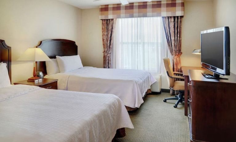 Day use twin room with TV and work desk at Homewood Suites By Hilton Burlington.