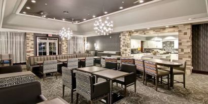 Dining area perfect for co-working at Homewood Suites By Hilton Burlington.