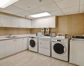 Laundry room at Homewood Suites By Hilton Burlington.