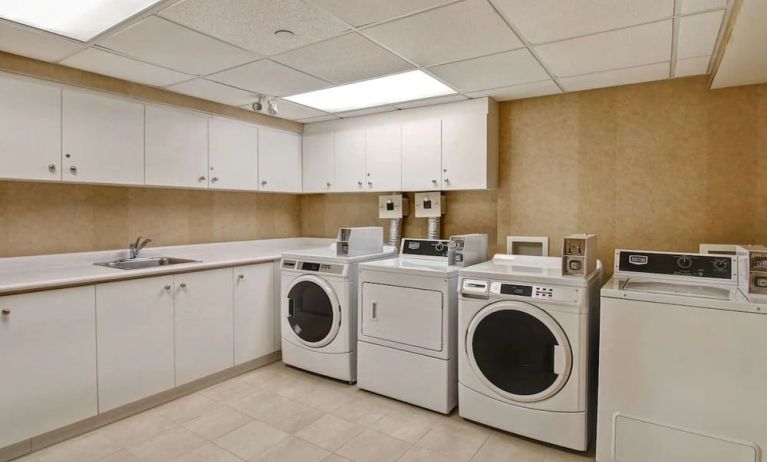 Laundry room at Homewood Suites By Hilton Burlington.