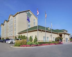 Hotel exterior and parking area at Homewood Suites By Hilton Burlington.