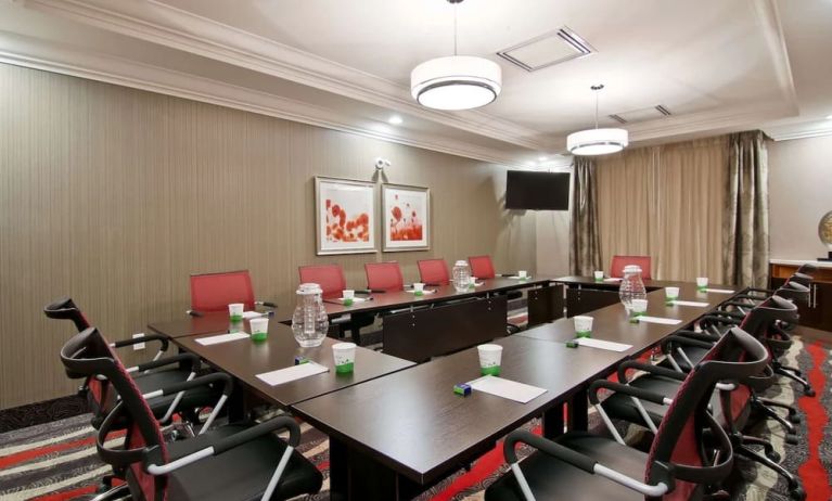 Comfortable meeting room suitable for small groups at the Hampton Inn & Suites by Hilton Toronto Markham.