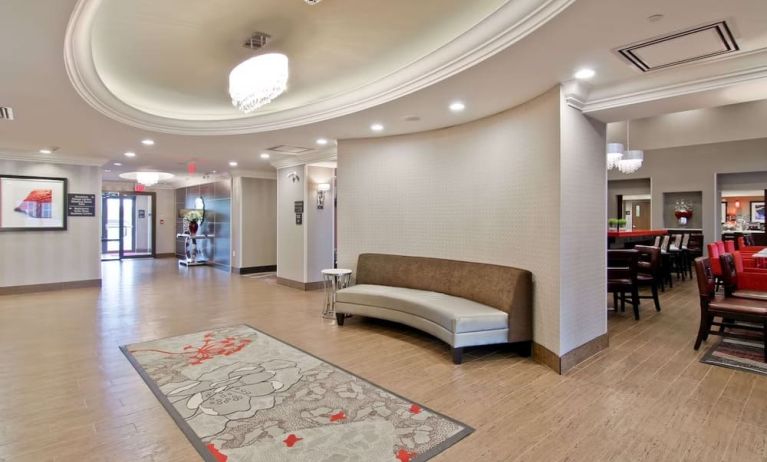 Hotel lobby with lounge area at the Hampton Inn & Suites by Hilton Toronto Markham.