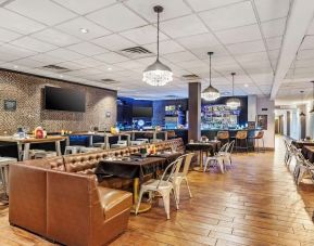 Dining area perfect for coworking at Best Western Plus Newark Airport West.