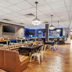 Dining area perfect for coworking at Best Western Plus Newark Airport West.