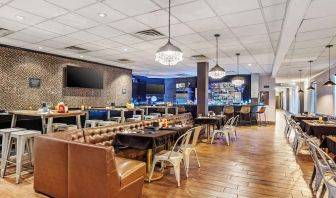 Dining area perfect for coworking at Best Western Plus Newark Airport West.