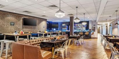 Dining area perfect for coworking at Best Western Plus Newark Airport West.