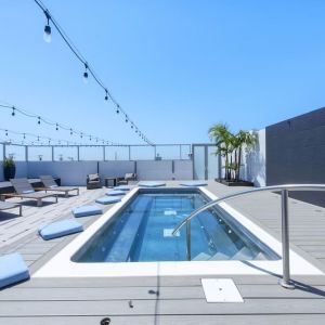 Refreshing outdoor pool and lounge chairs at Shade Hotel Manhattan Beach.