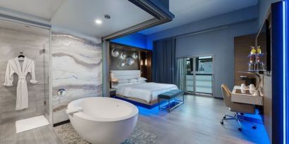 Spacious day use room with tub, work desk and balcony at Shade Hotel Manhattan Beach.