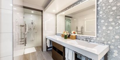 Guest bathroom with shower at Shade Hotel Manhattan Beach.