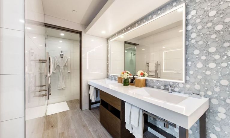 Guest bathroom with shower at Shade Hotel Manhattan Beach.