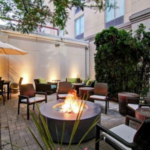 Hotel patio with fire place at Hilton Garden Inn Toronto/Burlington.