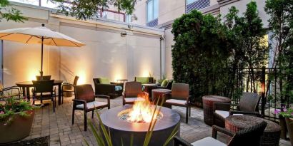 Hotel patio with fire place at Hilton Garden Inn Toronto/Burlington.