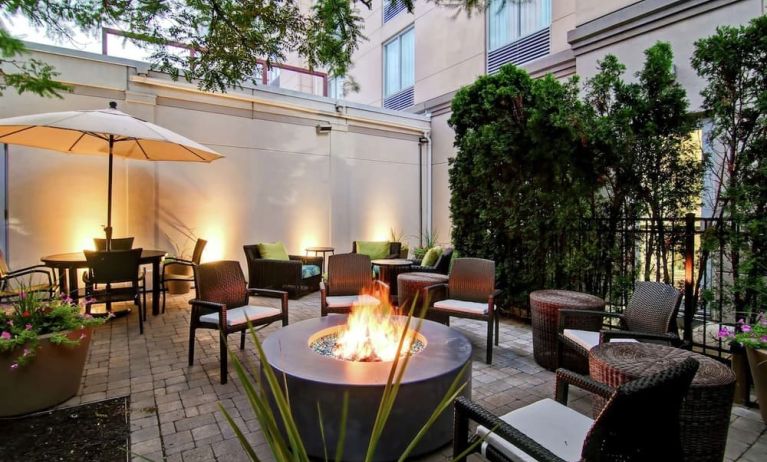 Hotel patio with fire place at Hilton Garden Inn Toronto/Burlington.