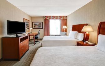 Twin room with TV and work desk at Hilton Garden Inn Toronto/Burlington.