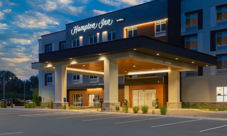 Hotel exterior and parking area at Hampton Inn By Hilton Port Hope.