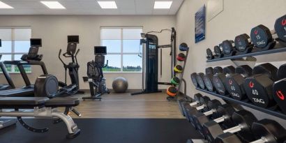 Equipped fitness center with treadmills at Hampton Inn By Hilton Port Hope.