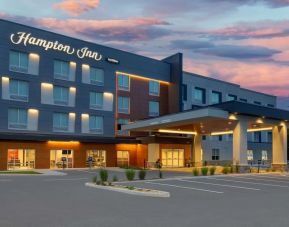 Hotel exterior and parking area at Hampton Inn By Hilton Port Hope.