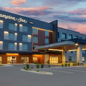 Hotel exterior and parking area at Hampton Inn By Hilton Port Hope.