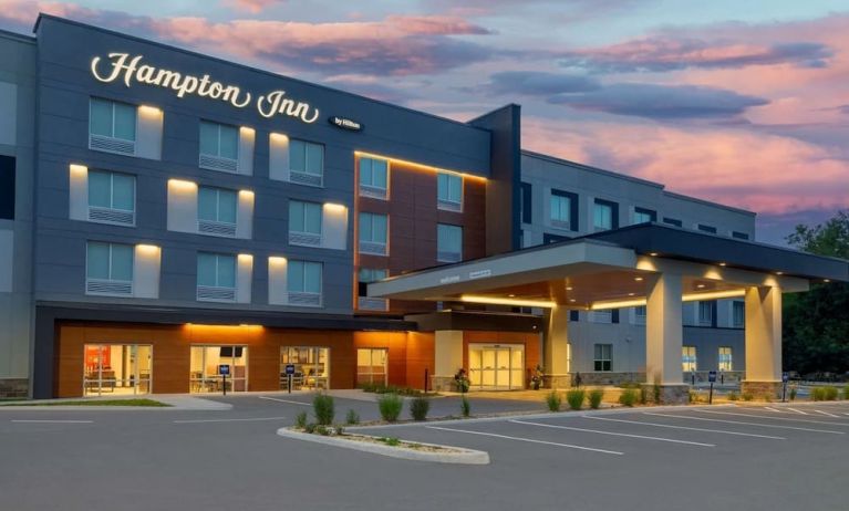 Hotel exterior and parking area at Hampton Inn By Hilton Port Hope.