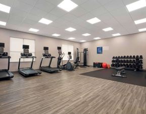 Equipped fitness center with treadmills at Hampton Inn By Hilton Port Hope.