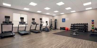 Equipped fitness center with treadmills at Hampton Inn By Hilton Port Hope.