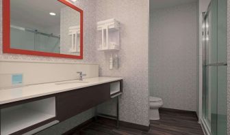 Private guest bathroom with toiletries at Hampton Inn By Hilton Port Hope.