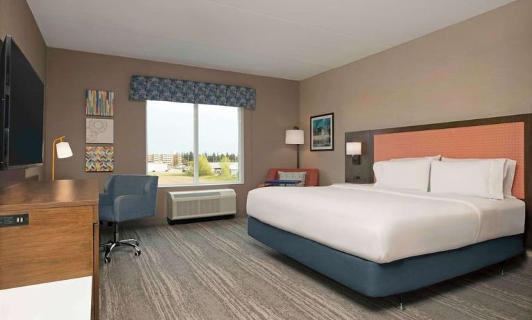 Day use king room with TV and work desk at Hampton Inn By Hilton Port Hope.