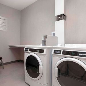 Guest laundry room at Hampton Inn By Hilton Port Hope.