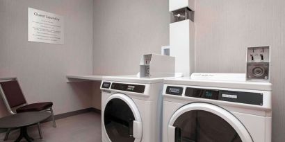 Guest laundry room at Hampton Inn By Hilton Port Hope.