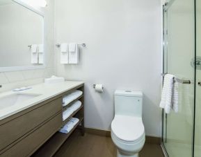 Private guest bathroom with shower and toiletries at Comfort Inn & Suites Barrie.