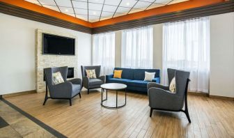 Hotel lobby with lounge area at Comfort Inn & Suites Barrie.