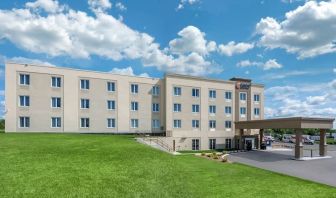 Hotel exterior and parking area at Comfort Inn & Suites Napanee.