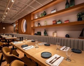 Dining area at The Hollis Halifax - A DoubleTree Suites By Hilton.