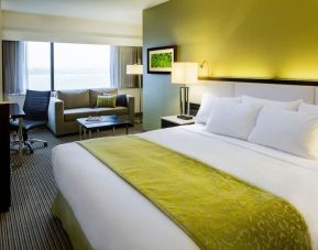 Bright and spacious day use room with living area and work desk at The Hollis Halifax - A DoubleTree Suites By Hilton.