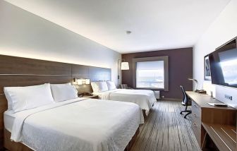 Bright and spacious day use twin room with TV and work desk at Holiday Inn Express & Suites Airport-Calgary.