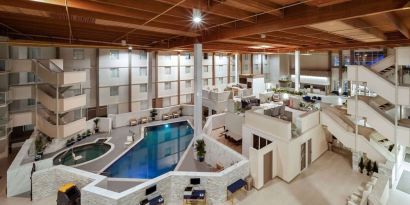 Pool area at Wyndham DFW Airport.