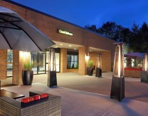 Outdoor seating at night at Boston Marriott Burlington.