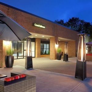 Outdoor seating at night at Boston Marriott Burlington.