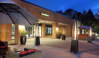 Outdoor seating at night at Boston Marriott Burlington.