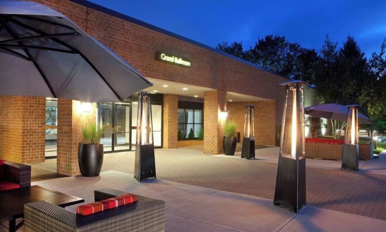 Outdoor seating at night at Boston Marriott Burlington.