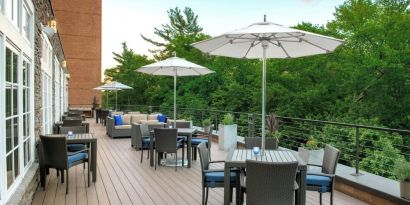 Outdoor seating and garden at Boston Marriott Burlington.