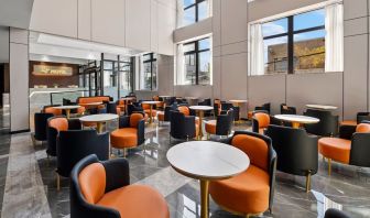 Dining and lounge area at Ly New York Hotel.