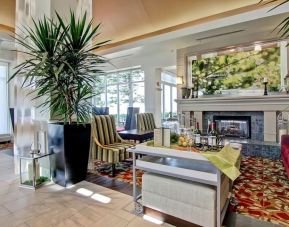 Hotel lobby with lounge area at Hilton Garden Inn Calgary Airport.