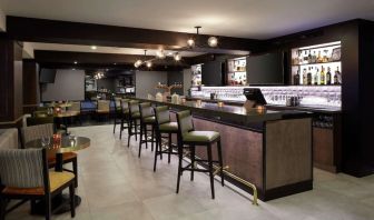 Hotel bar with lounge area perfect for co-working at DoubleTree By Hilton Montreal Airport.