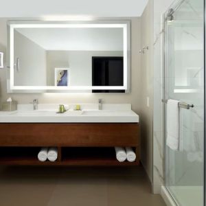 Private guest bathroom with shower and toiletries at DoubleTree By Hilton Montreal Airport.