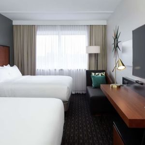 Day use Twin room with TV, work desk and private bathroom at DoubleTree By Hilton Montreal Airport.