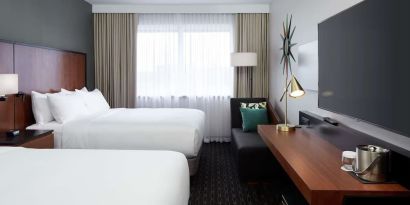 Day use Twin room with TV, work desk and private bathroom at DoubleTree By Hilton Montreal Airport.